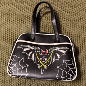 Sourpuss Halloween purse